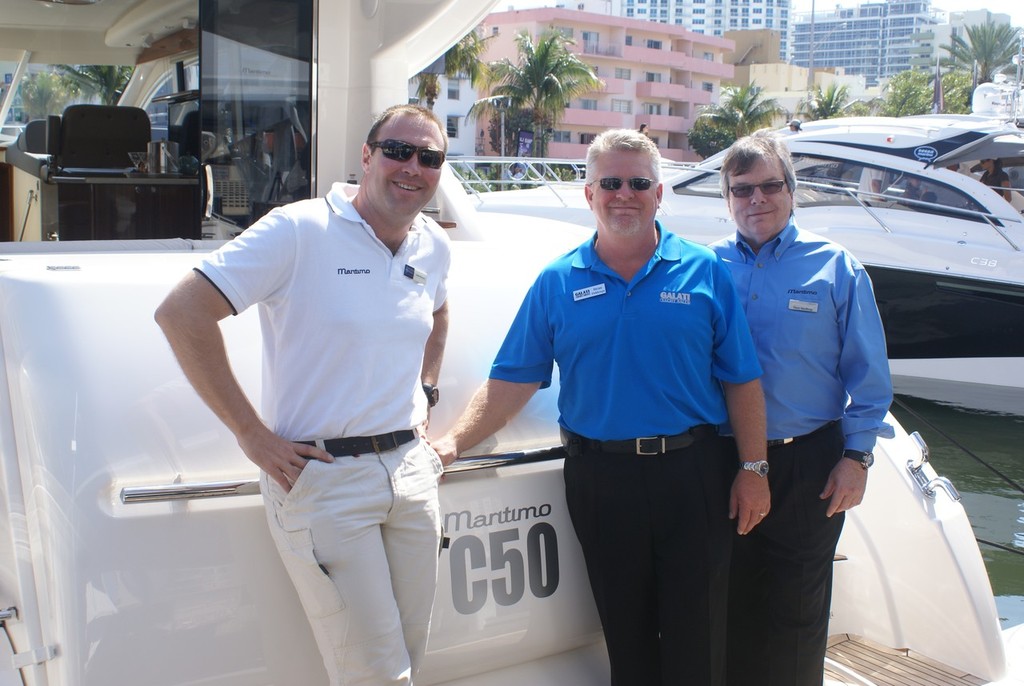 Maritimo men, Marketing Director Luke Durman (left) and President, Maritimo USA Dave Northrop (right) with Galati Yachts dealer Brian Dekkinga. © Bob Wonders